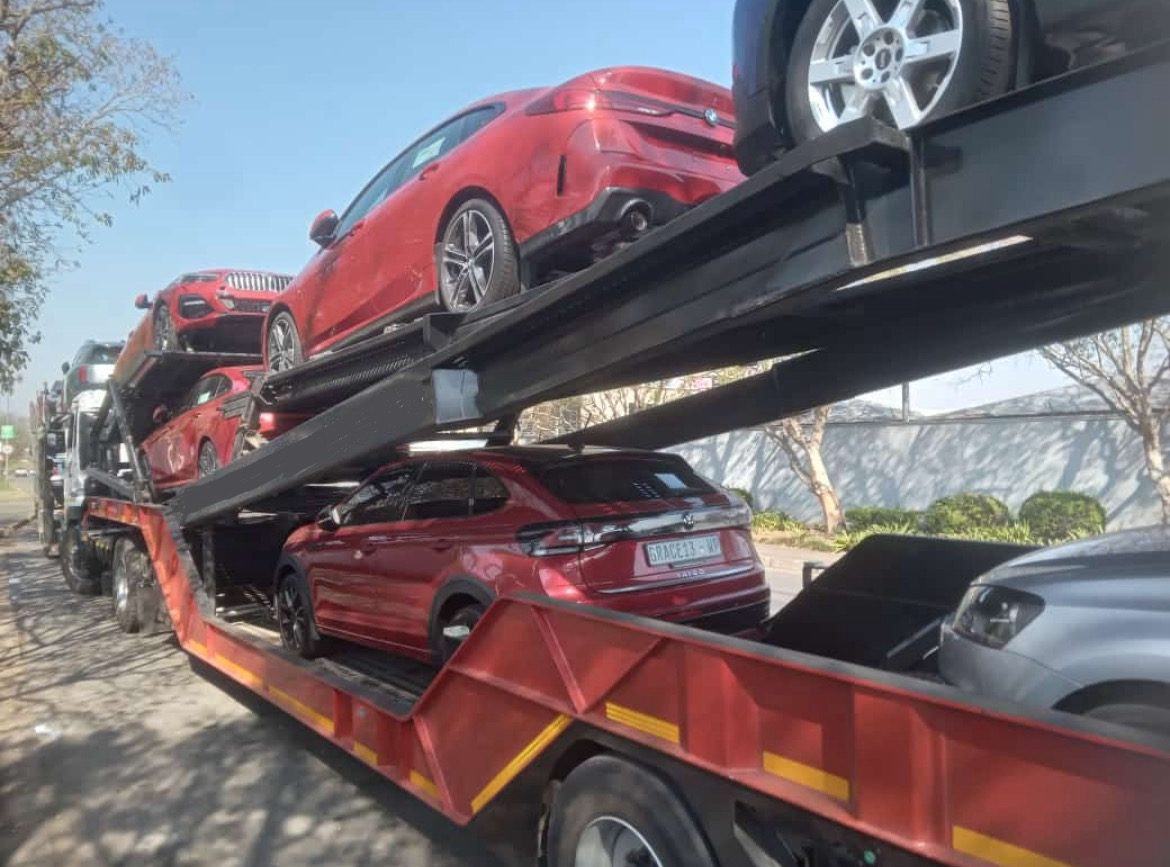Cars loaded on a transporter for vehicle sales